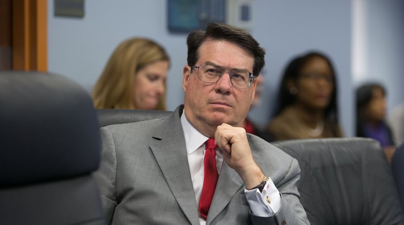 Sandy Springs Mayor Rusty Paul attends a county meeting at the Fulton County Government Center in this 2015 file photo.