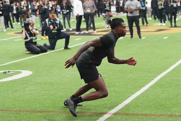Colorado wide receiver Travis Hunter takes part in passing drills during Colorado's NFL football pro day Friday, April 4, 2025, in Boulder, Colo. (AP Photo/David Zalubowski)