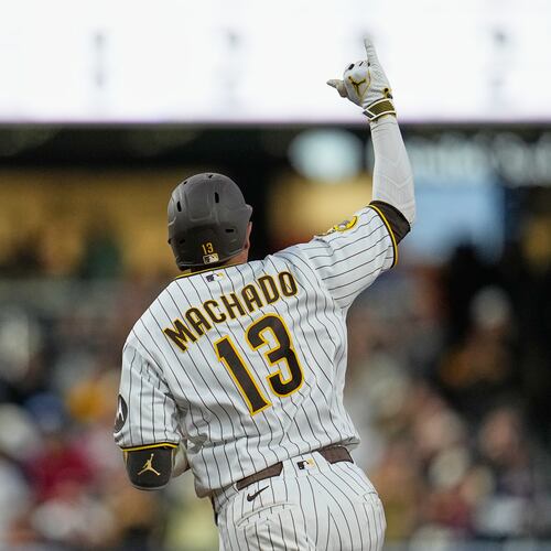 San Diego Padres' Manny Machado celebrates after hitting a home run during the fourth inning of a baseball game against the Atlanta Braves Monday, June 22, 2026, in San Diego. (AP Photo/Gregory Bull)