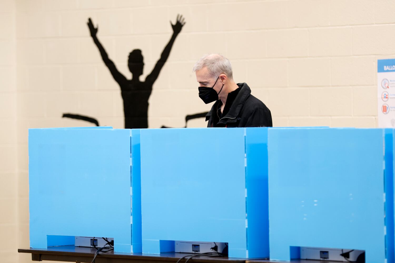 A voter cast his ballot at Briarlake Elementary School early Tuesday during election day, December 6, 2022.
 Miguel Martinez / miguel.martinezjimenez@ajc.com