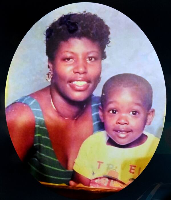 Bridgett Lockhart (pictured) was killed after an argument with her boyfriend in 1999, police said. She had two young children. (Hyosub Shin/AJC)