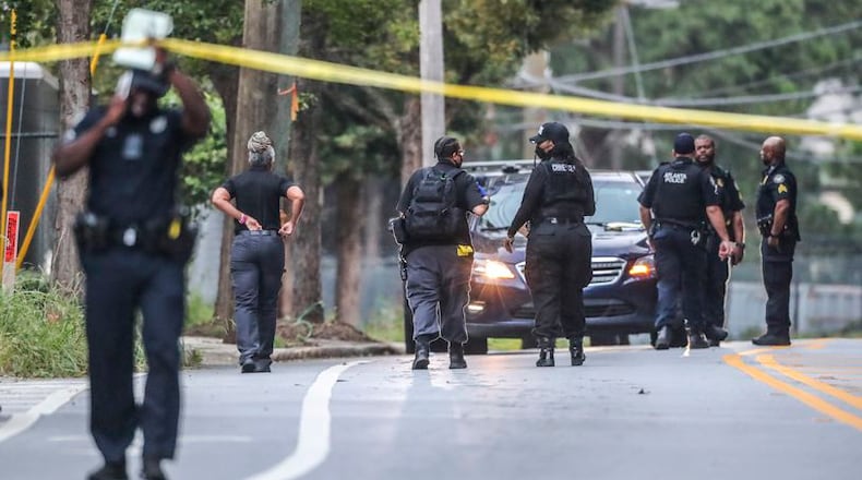 The Atlanta Police Department is still nearly 430 officers shy of its authorized levels, but department leaders say fewer people are leaving this year. JOHN SPINK / THE ATLANTA JOURNAL-CONSTITUTION