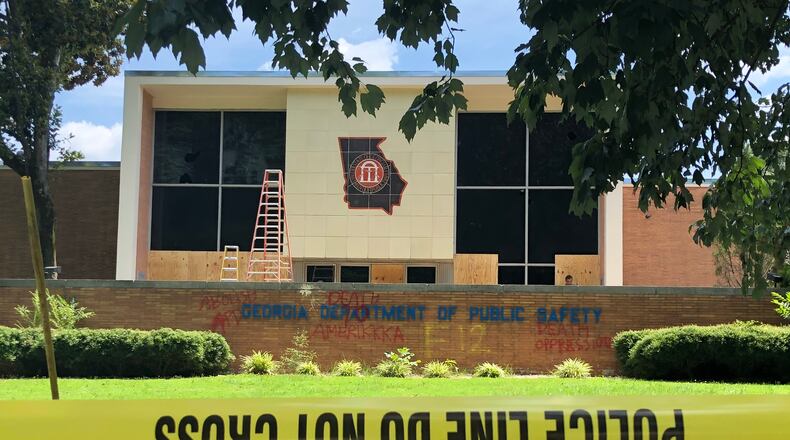 The Georgia Department of Public Safety headquarters on United Avenue suffered broken windows and was tagged with graffiti following a protest that turned violent early Sunday.