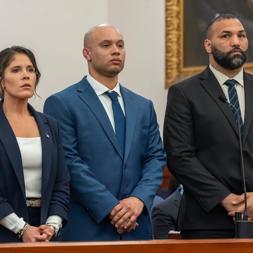 Massachusetts State Police Lt. Jennifer Penton, from left, and troopers David Montanez and Edwin Rodriguez, are arraigned on charges of involuntary manslaughter in the death of Enrique Delgado-Garcia, in Worcester Superior Court, Thursday, April 2, 2026, in Worcester, Mass. (Rick Cinclair/Worcester Telegram & Gazette via AP, Pool)