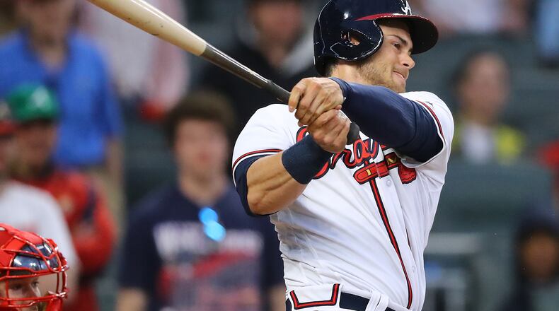 Preston Tucker of the Braves hits an RBI single Thursday, March 29, 2018, in Atlanta. Curtis Compton/ccompton@ajc.com