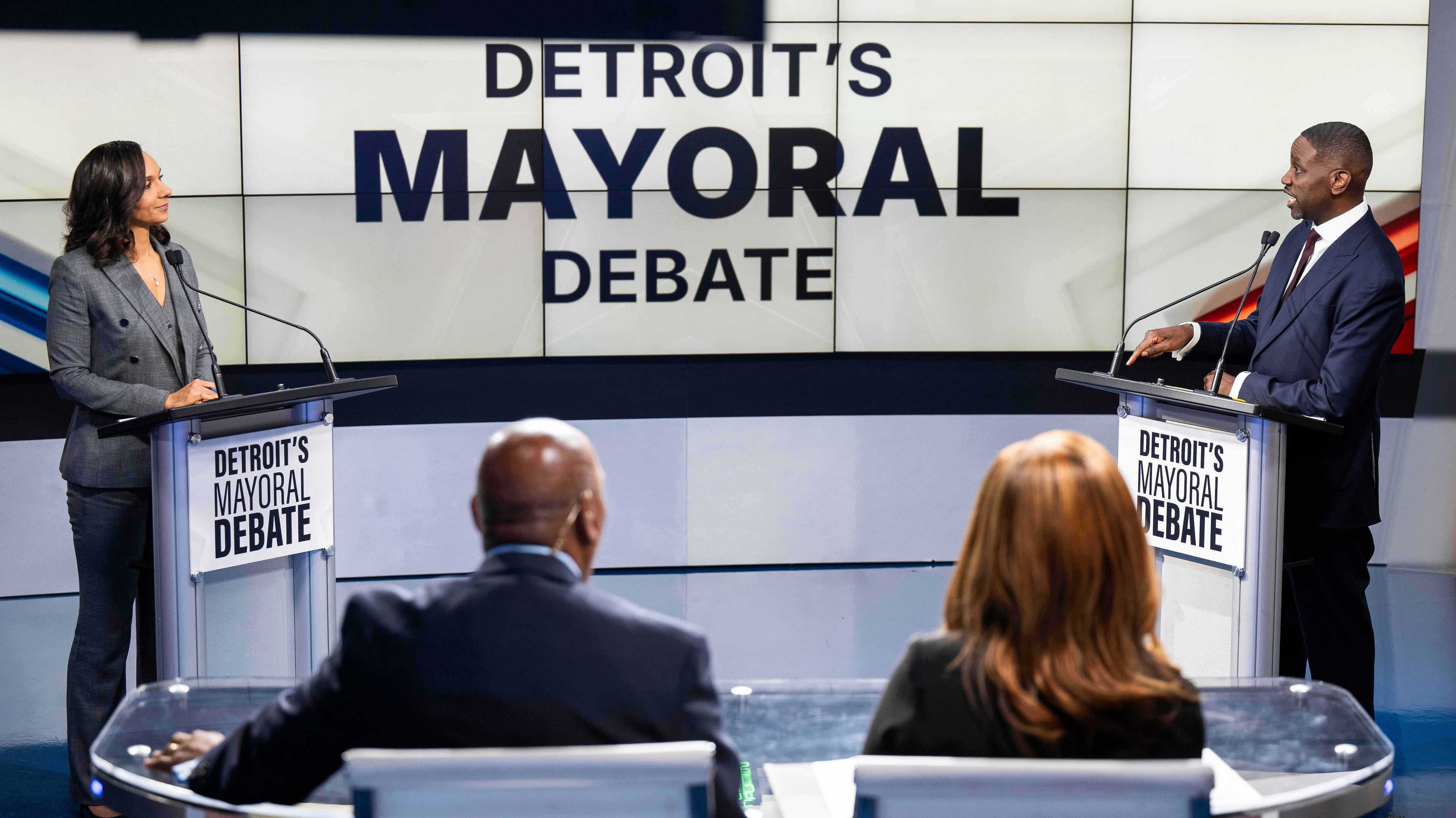Detroit City Council President Mary Sheffield, left, and Solomon Kinloch Jr., right, face off in a televised debate between the two remaining candidates in Detroit's mayoral race on Wednesday, Oct. 15, 2025, at the WXYZ-TV studio in Southfield, Mich. (Katy Kildee/Detroit News via AP)