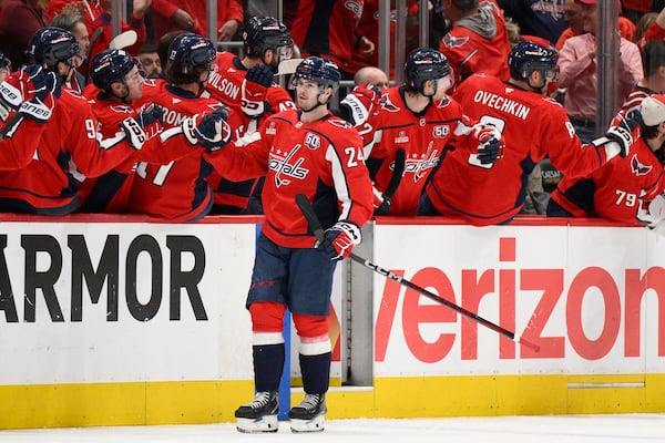Washington Capitals center Connor McMichael (24) celebrates his goal in the second period of Game 2 of a first-round NHL hockey playoff series against the Montreal Canadiens Wednesday, April 23, 2025, in Washington. (AP Photo/Nick Wass)