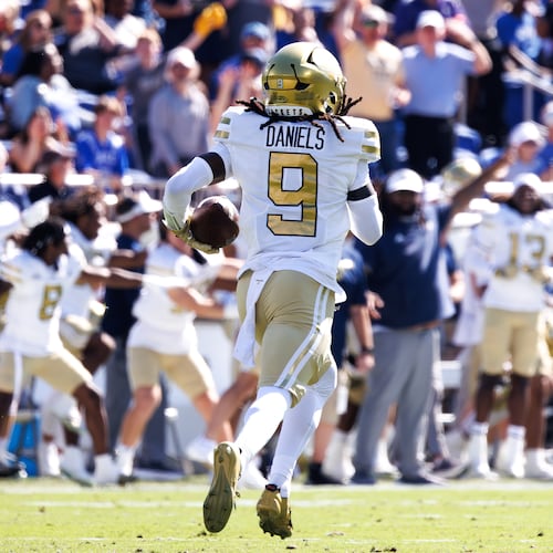 Georgia Tech's Omar Daniels returns a fumble for a 95-yard touchdown Saturday, Oct. 18, 2025, against Duke in Durham, N.C. (AP Photo/Ben McKeown)