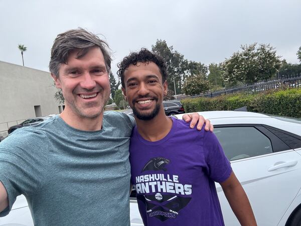 Atlanta actor Rob Lathan (left) with the "Jury Duty: Corporate Retreat" temp Anthony Norman, who was the only non-actor on camera during the season and learned this only when it ended. (Courtesy of Rob Lathan)
