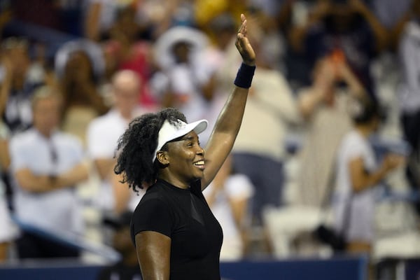 Venus Williams waves to the crowd as she celebrates her win over Peyton Stearns during a match at the Citi Open tennis tournament Tuesday, July 22, 2025, in Washington. (AP Photo/Nick Wass)