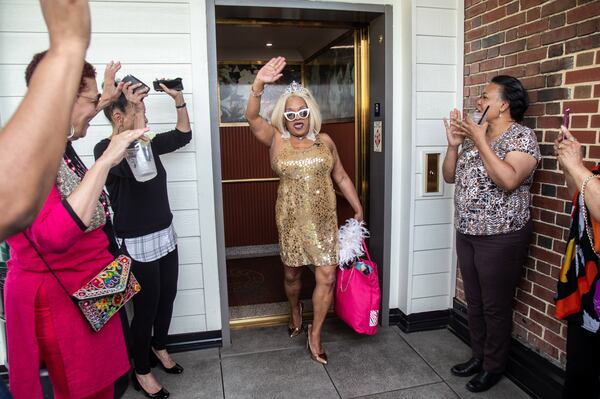 The Atlanta entertainment icon Blondie makes her big entrance as she walks off the elevator for a celebration marking her 40th anniversary at the Clermont Lounge. Sunday, April 28, 2019. (Photo: STEVE SCHAEFER / SPECIAL TO THE AJC)
