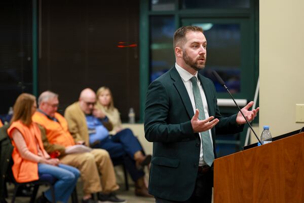 Kerry McCormack, a representative with Flock, a license plate reader company, gives a presentation to Dunwoody’s City Council at Dunwoody City Hall, Monday, Feb. 23, 2026, in Dunwoody, Ga. (Jason Getz/AJC)