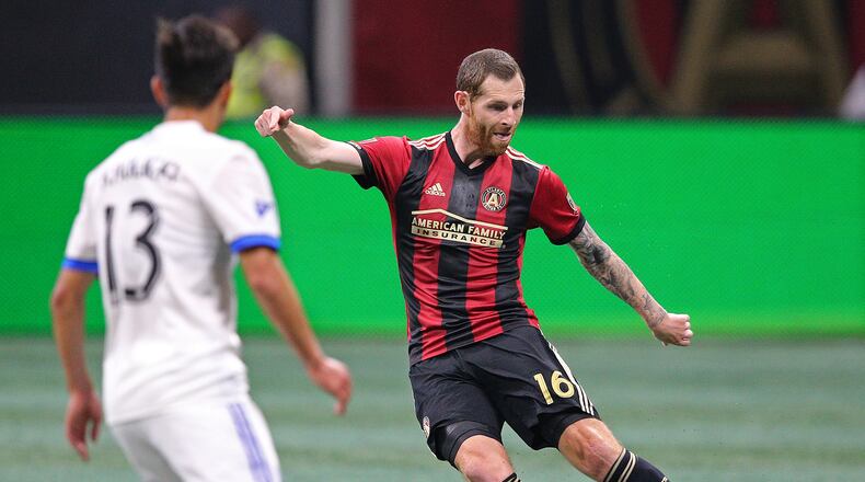 April 28, 2018 Atlanta: Atlanta United midfielder Chris McCann works against Montreal Impact during the first half in a MLS soccer match on Saturday, April 28, 2018, in Atlanta.  Curtis Compton/ccompton@ajc.com