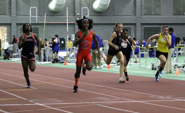 Bloomfield High School transgender athlete Terry Miller, second from left, wins the final of the 55-meter dash over transgender athlete Andraya Yearwood, far left, and other runners.
