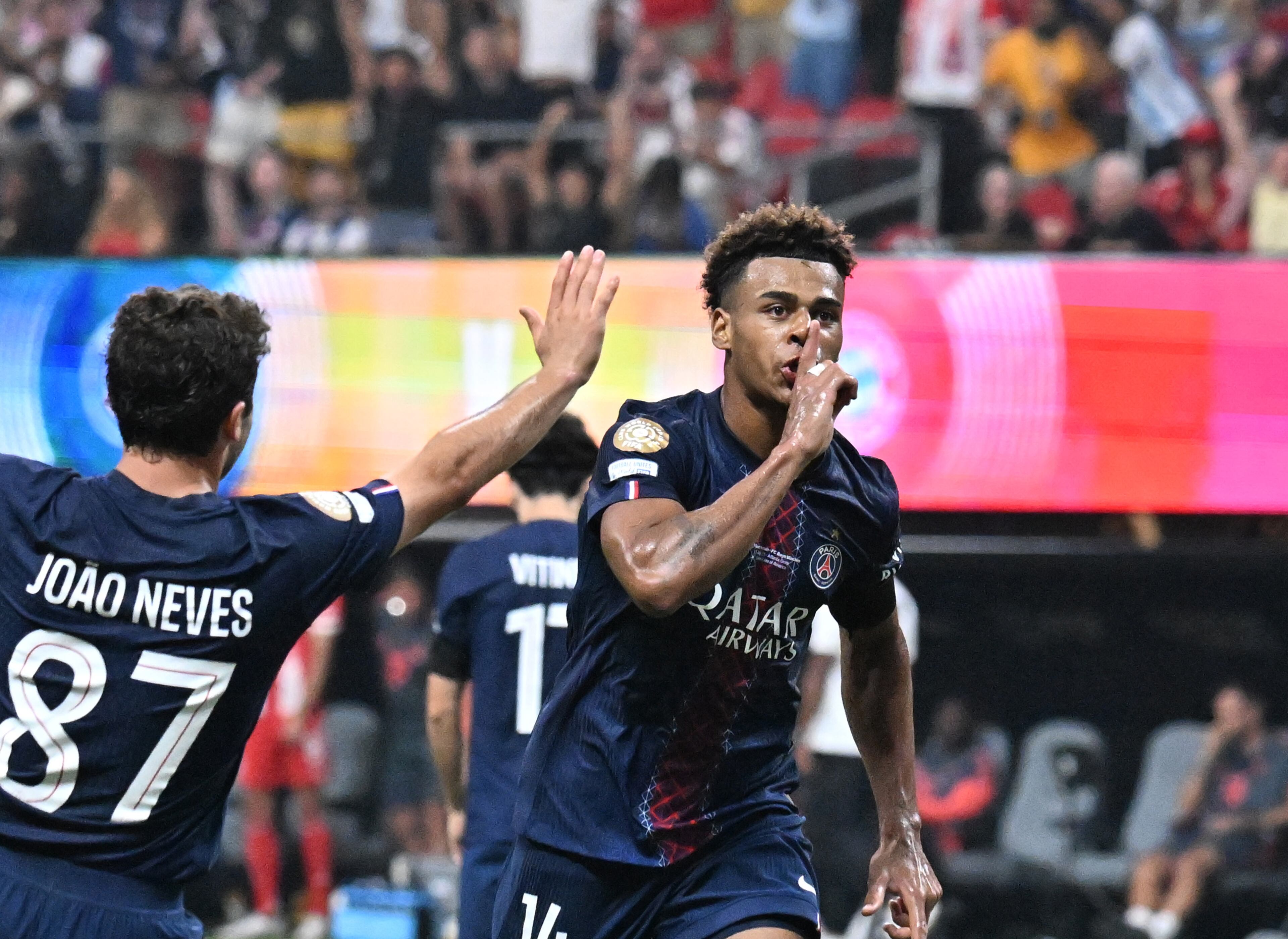 Paris Saint-Germain midfielder Désiré Doué (14) celebrates with teammates after scoring during the second half in Club World Cup quarterfinals match at Mercedes-Benz Stadium, Saturday, July 5, 2025, in Atlanta. Paris Saint-Germain won 2-0 over Bayern Munich. (Hyosub Shin / AJC)