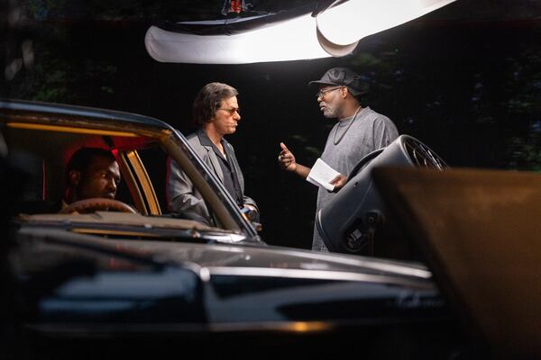 Mark Wahlberg, left, and director Elegance Bratton (right) on the set of Paramount Pictures' "By Any Means." (Courtesy of Paramount Pictures)