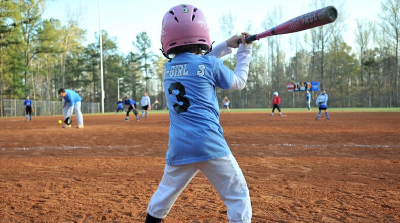 Hobgood Baseball Inc. will continue to have use of the softball fields at Bascomb and Carmel elementary schools in Woodstock under a recently renewed partnership agreement with the Cherokee School District. AJC FILE
