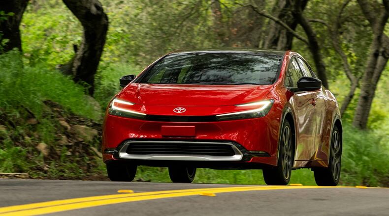 This photo provided by Toyota shows a 2024 Prius Prime. The Prius Prime is sleek and stylish, but even more exciting are its 50-plus miles of all-electric range and high fuel economy. (Courtesy of Toyota Motor Sales U.S.A. via AP)