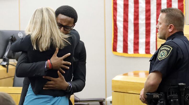Botham Jean’s younger brother Brandt Jean asked the judge if he could give convicted murderer Amber Guyger a hug after delivering his impact statement at the Frank Crowley Courts Building in Dallas, Texas, on Oct. 2, 2019. The fired Dallas police officer was found guilty of murder by a 12-person jury. TOM FOX / THE DALLAS MORNING NEWS / POOL / TNS