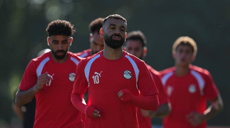 Egypt's Mohamed Salah, front, works out with teammates during a training session Saturday, June 20, 2026, on the eve of the team's World Cup Group G soccer match against New Zealand in Vancouver, British Columbia. (AP Photo/Abbie Parr)
