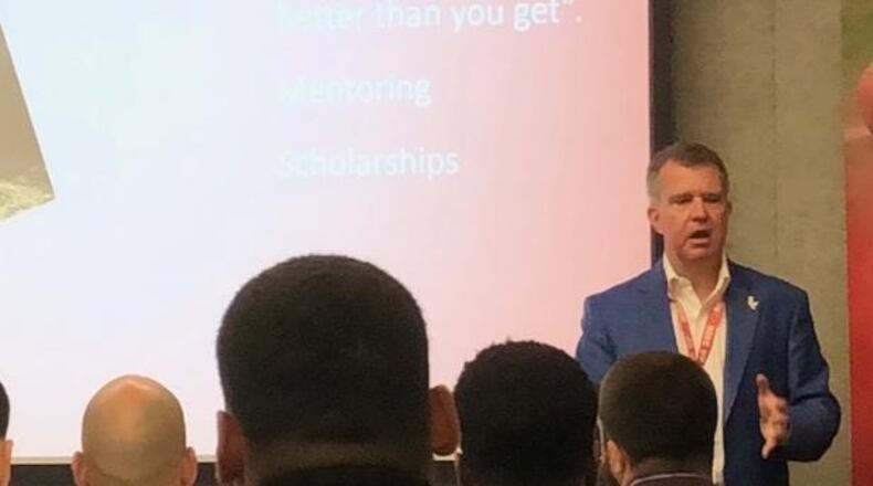 Fred Weir, Zaxby's Atlanta Co-op president, discussing their business model, culture and franchising opportunities with several Atlanta Falcons on Thursday, February 22, 2018 at NCR. (Photo by D. Orlando Ledbetter)