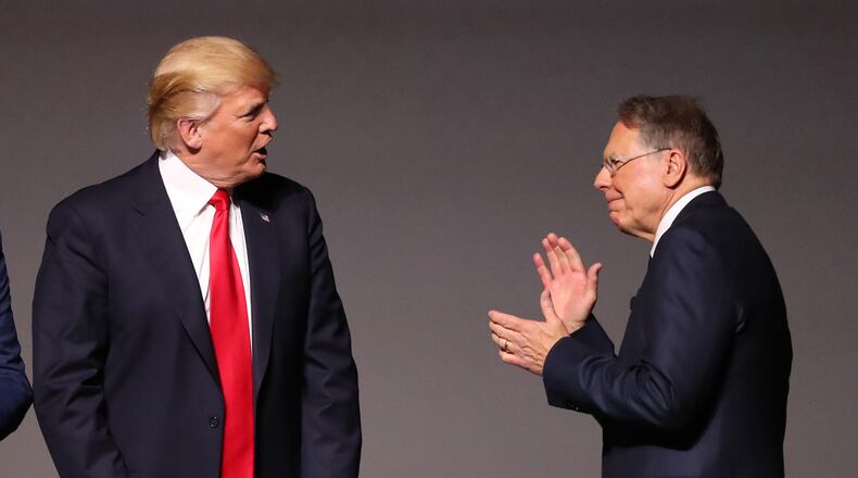 April 28, 2017, Atlanta: CEO Wayne LaPierre, whose welcoming remarks included a (presumably figurative) suggestion to give the media a black eye, introduces President Donald J. Trump at the NRA-ILA Leadership Forum on Friday, April 28, 2017, in Atlanta. Curtis Compton/ccompton@ajc.com