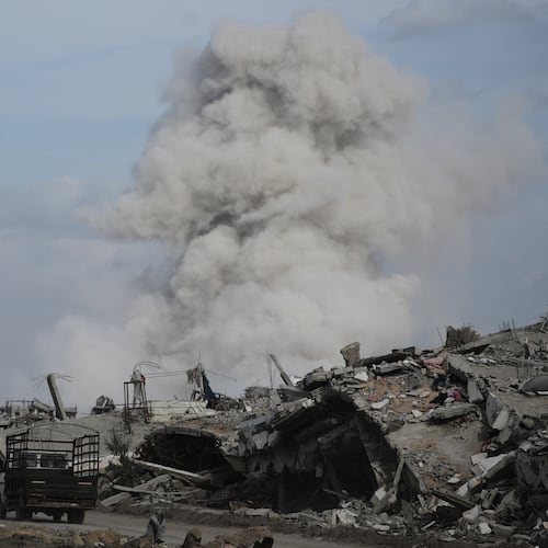 Smoke rises as Israeli military demolish a house east of Gaza City, Tuesday, Dec. 9, 2025. (AP Photo/Jehad Alshrafi)