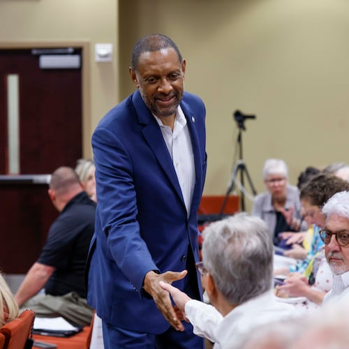 Secretary of state candidate Vernon Jones greets attendees at a State Election Board meeting held at the Dawson County Government Center on Wednesday, April 15, 2026. (Miguel Martinez/AJC)
