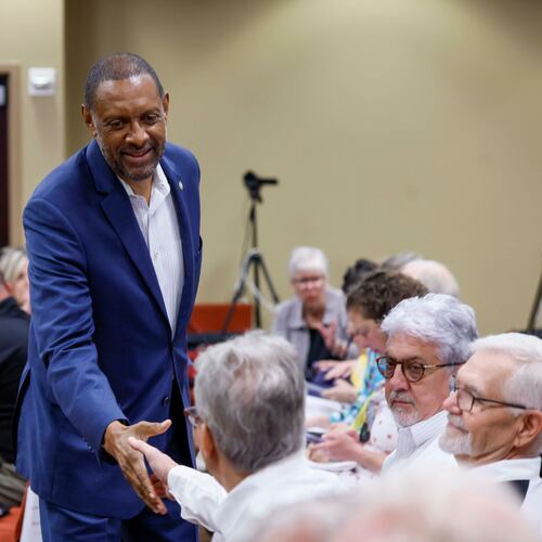 Secretary of state candidate Vernon Jones greets attendees at a State Election Board meeting held at the Dawson County Government Center on Wednesday, April 15, 2026. (Miguel Martinez/AJC)