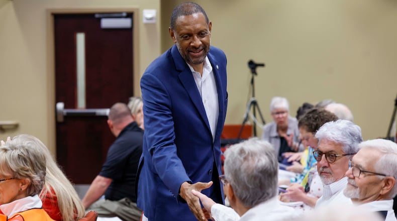 Secretary of state candidate Vernon Jones greets attendees at a State Election Board meeting held at the Dawson County Government Center on Wednesday, April 15, 2026. (Miguel Martinez/AJC)