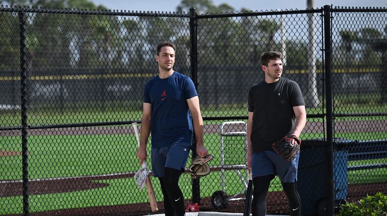 Atlanta Braves first base Matt Olson (left) and third base Austin Riley walk back to the clubhouse during spring training workouts at CoolToday Park, Thursday, February 13, 2025, North Port, Florida. (Hyosub Shin / AJC)