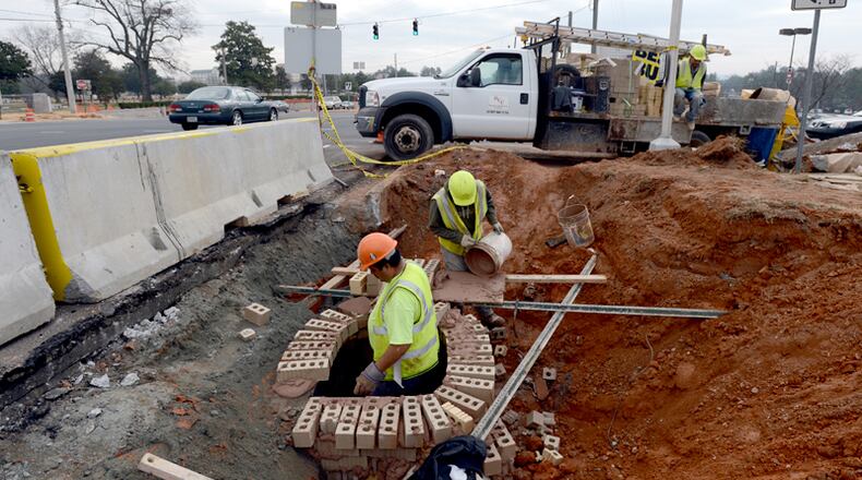 Roswell will spend up to $500,000 on right-of-way services for the Rucker Road improvement project and $260,000 to acquire land for the Oxbo Road realignment. AJC FILE
