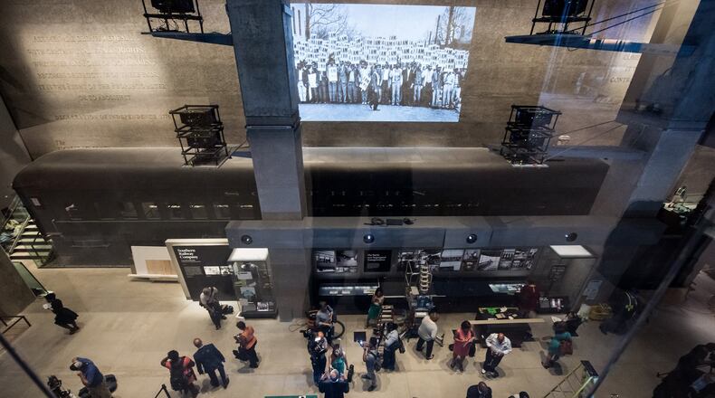 A Jim Crow-era segregated passenger train coach restored is on display at the Smithsonian’s National Museum of African American History and Culture on Sept. 14, 2016, in Washington, D.C. Opening to the public on Sept. 24, it will be a primary exhibition space for African-American history and culture in the 400,000-square-foot building adjacent to the Washington Monument. (Ken Cedeno/McClatchy Washington Bureau/TNS)