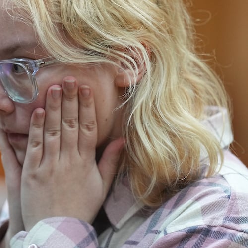 Diana Loginova, an 18-year-old Russian singer of Stoptime street band who served two consecutive 13-day prison sentences on various misdemeanor charges, sits during a court session in St. Petersburg, Russia, Tuesday, Nov. 11, 2025. (AP Photo/Dmitri Lovetsky