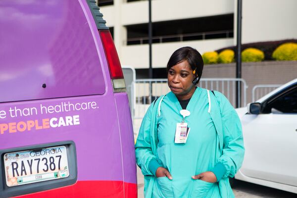 Susan Ellis, employee at Wellstar, stands outside the Atlanta Medical Center on Monday, October 31, 2022, in Atlanta. Ellis worked at Atlanta Medical Center before its closing and has now been relocated to Wellstar Kennestone Hospital in Cobb County. CHRISTINA MATACOTTA FOR THE ATLANTA JOURNAL-CONSTITUTION