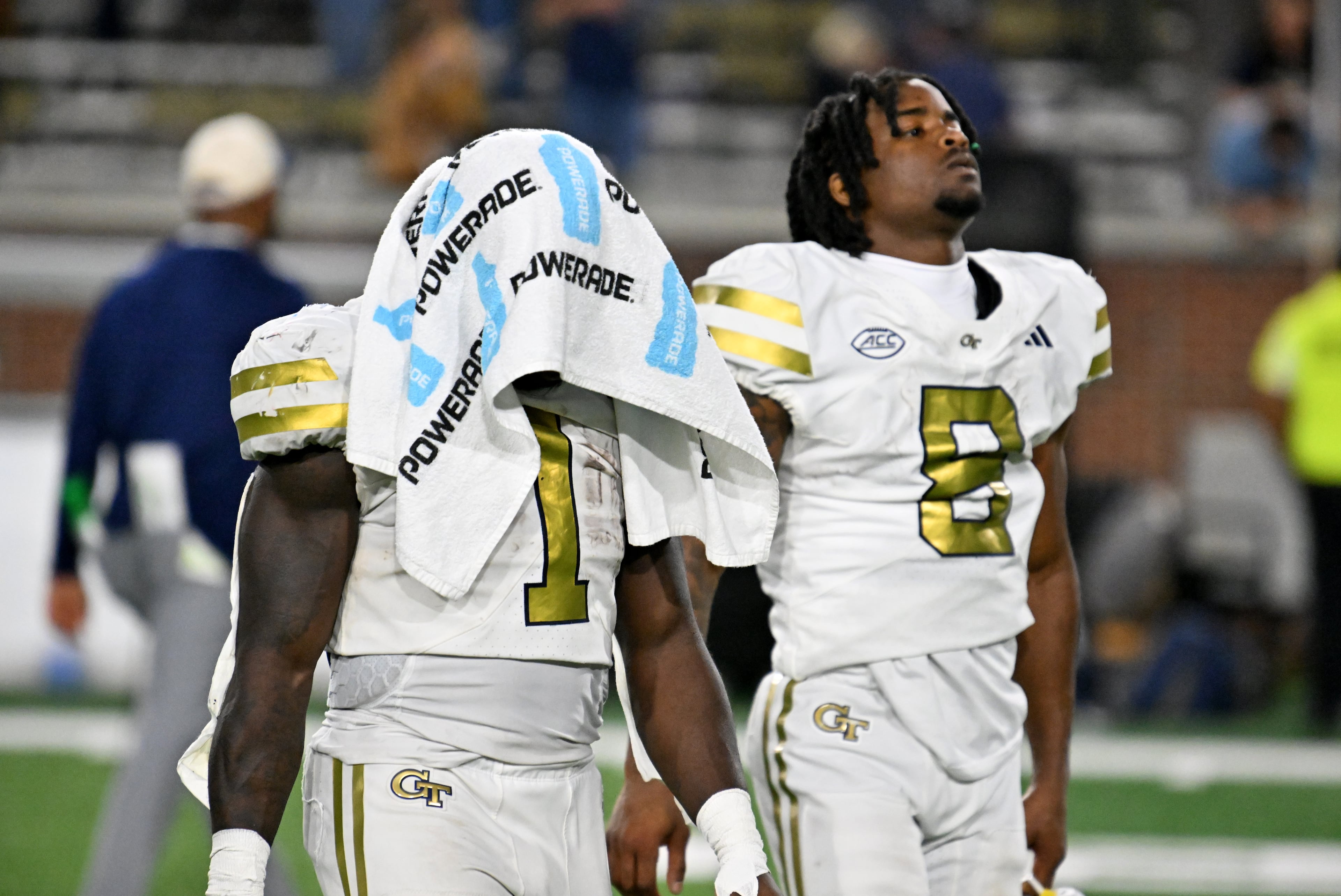 Georgia Tech running back Jamal Haynes (1) and Georgia Tech wide receiver Malik Rutherford (8) leave the field after Pittsburgh beat Georgia Tech during an NCAA college football game at Bobby Dodd Stadium, Saturday, November 22, 2025 in Atlanta. Pittsburgh won 42-28 over Georgia Tech. (Hyosub Shin / AJC)