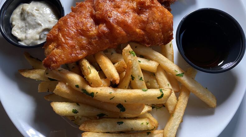 The Porter Beer Bar’s fish and chips comes with beer-battered cod, Belgian fries, pickled green tomato tartar sauce and malt vinegar. Bob Townsend for The Atlanta Journal-Constitution.