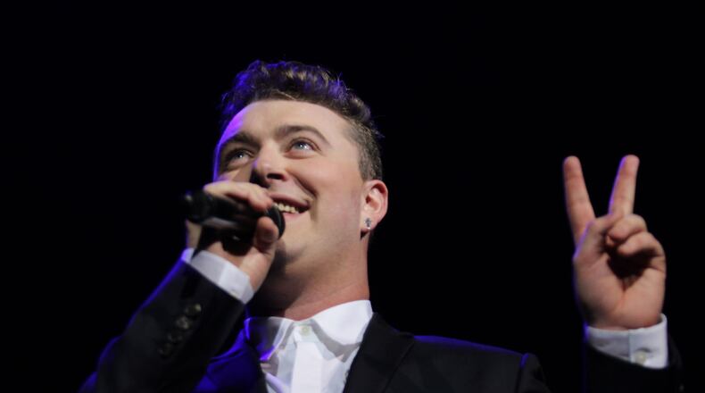 Oct. 6, 2014 - ATLANTA - British soul singer Sam Smith performing before a sold out audience at the Tabernacle Monday. Smith holds up two fingers in reference to his where his debut album reached on U.S. charts. (Akili-Casundria Ramsess/Special to the AJC) There is a definite authenticity to Smith's brand of soul. Photo: Akili-Casundria Ramsess/Special to the AJC