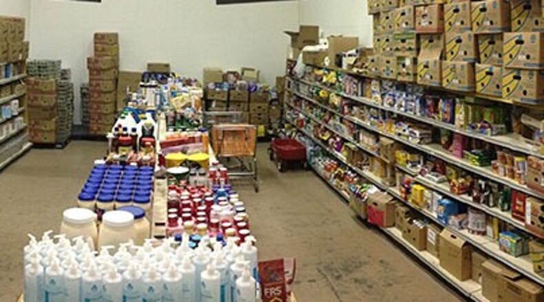 In Mableton, free food is given from 10 a.m. to 3 p.m. Tuesdays through Fridays, fresh fruit and vegetables from noon to 3 p.m. Wednesdays and Fridays and hot lunches from noon to 3 p.m. every Friday. (Courtesy of Family Life Restoration Center)