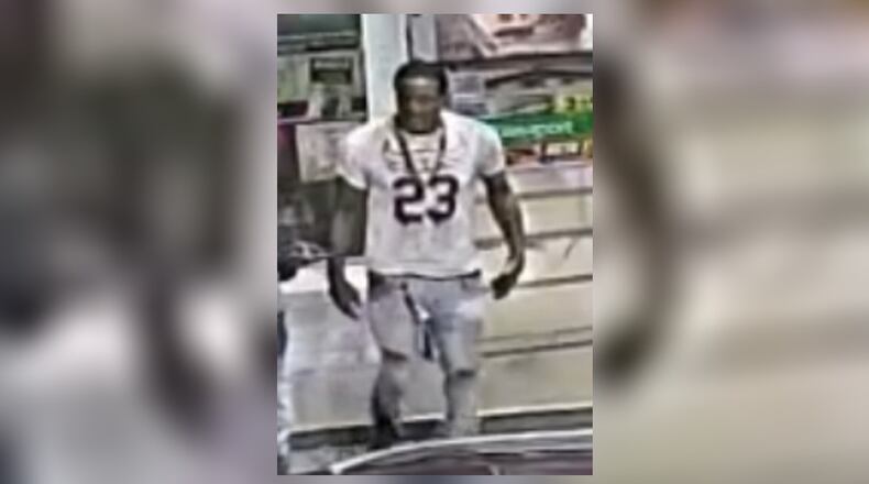 Police are offering a reward of up to $5,000 for information identifying this suspect in a May 21 armed robbery outside an Exxon gas station along Joseph E. Boone Boulevard.