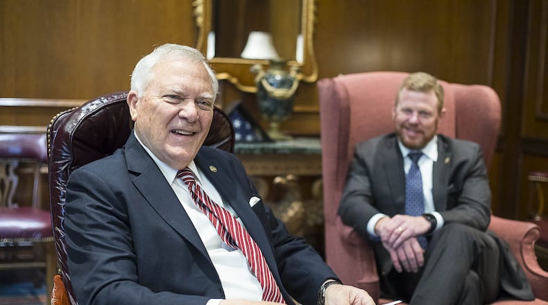 Gov. Nathan Deal, left, speaks about his two terms in Georgia’s top office as his chief of staff, Chris Riley, listens. (ALYSSA POINTER/ALYSSA.POINTER@AJC.COM)