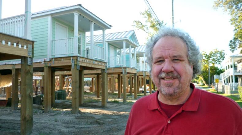 Architect Bruce Tolar with one of his cottage court communities built in his home base of Ocean Springs, Mississippi. Tolar, a veteran of New Orleans’ post-Hurricane Katrina rebuilding, will design Decatur’s first cottage court project, with building scheduled to start this fall. CONTRIBUTED