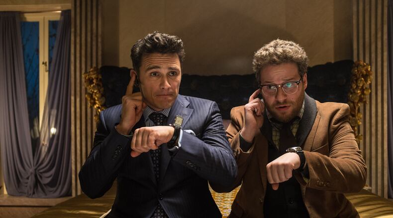 This image released by Columbia Pictures shows James Franco, left, and Seth Rogen in "The Interview." The comedy is set for release in 2014 on Christmas Day. (AP Photo/Columbia Pictures, Sony, Ed Araquel)