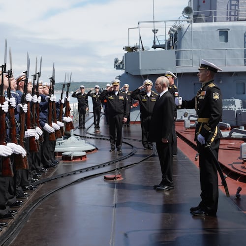 Russian President Vladimir Putin, second right, visits the Varyag missile cruiser of the Pacific Fleet to watch a military exercise near Yuzhno-Sakhalinsk, on Sakhalin Island, Russia, Wednesday, Aug. 12, 2026. (Gavriil Grigorov, Sputnik, Kremlin Pool Photo via AP)