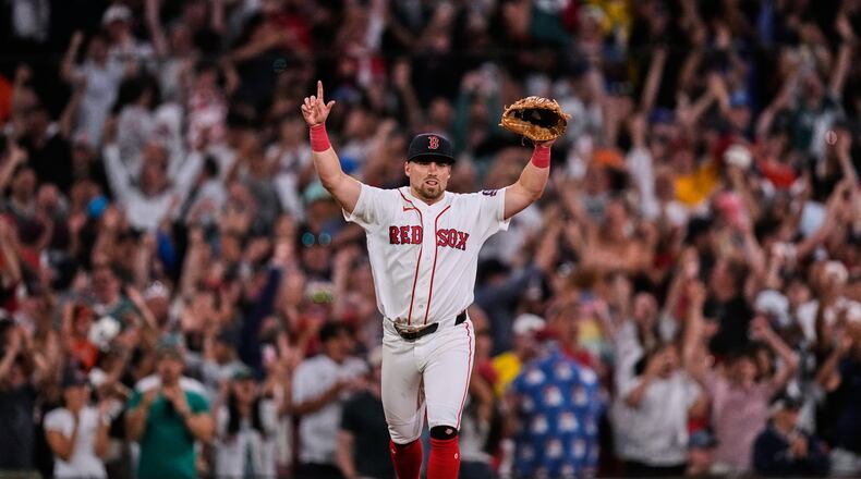 Boston Red Sox's Caleb Durbin celebrates after defeating the Baltimore Orioles following a baseball game, Monday, July 20, 2026, in Boston. (AP Photo/Charles Krupa)