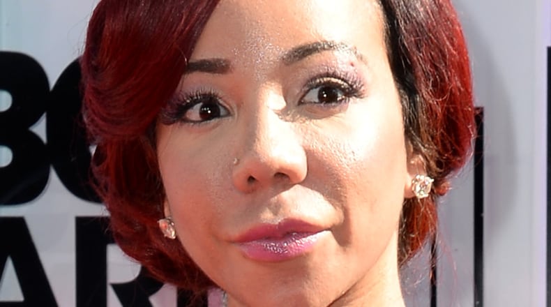 LOS ANGELES, CA - JUNE 29: Singer Tameka "Tiny" Harris attends the BET AWARDS '14 at Nokia Theatre L.A. LIVE on June 29, 2014 in Los Angeles, California. (Photo by Earl Gibson III/Getty Images for BET) LOS ANGELES, CA - JUNE 29: Singer Tameka "Tiny" Harris attends the BET AWARDS '14 at Nokia Theatre L.A. LIVE on June 29, 2014 in Los Angeles, California. (Photo by Earl Gibson III/Getty Images for BET)