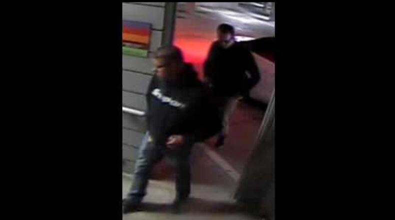 These are the two suspects Sandy Springs police are searching for in connection with a vehicle theft.