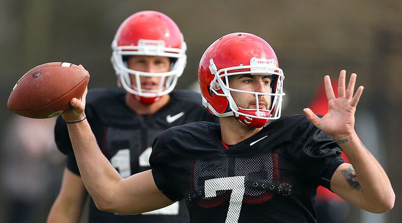 Quarterback Jacob Park, here practicing under the watch coach Mark Richt in March, has left Georgia with intentions to transfer to junior college. (UGA photo by John Kelley)