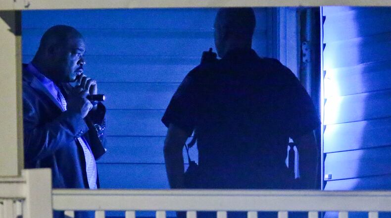 A predawn shooting at a Clarkston apartment complex Friday left one man dead and another in the hospital.