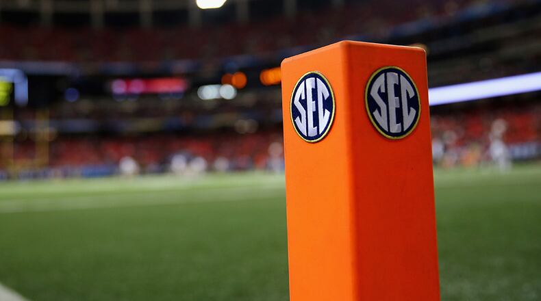 An “independent medical observer” watch out for head injuries at all football games involving SEC teams.